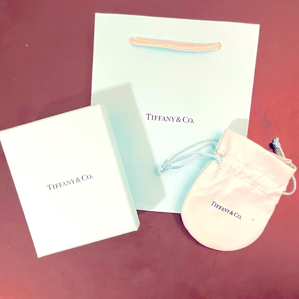 Tiffanys small bag(s), notecard and jewelry box.